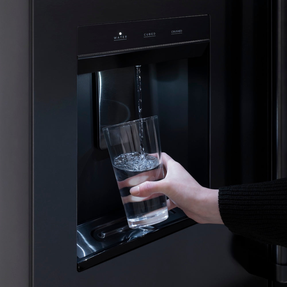 ZLINE Autograph Edition 36 in. 28.9 cu. ft. Standard-Depth French Door External Water Dispenser Refrigerator with Dual Ice Maker in Fingerprint-Resistant Black Stainless Steel and Champagne Bronze Traditional Handles (RSMZ-W-36-BS-CB) filling a glass with water from external water dispenser.