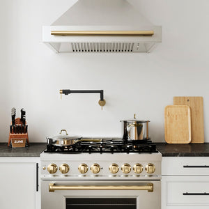 ZLINE Autograph Edition Gemini Pot Filler in Matte Black and Champagne Bronze (GEM-FPF-ZMBCB) in a luxury kitchen.