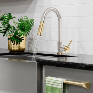 ZLINE Autograph Edition Gemini Pull Down Single Handle Kitchen Faucet in Brushed Nickel and Champagne Bronze (GEM-KF-ZBNCB) lifestyle, in a luxury kitchen with water on.