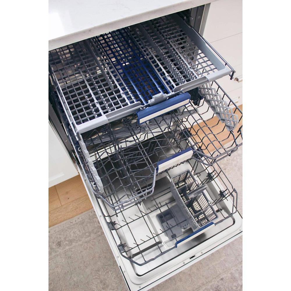 ZLINE Autograph Edition 24 in. Tallac Series 3rd Rack Top Control Built-In Tall Tub Dishwasher in Custom Panel Ready with Matte Black Handle, 51dBa (DWVZ-24-MB) open, with racks and compartments on a light-colored floor.