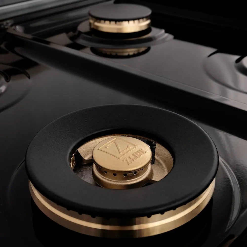 ZLINE Autograph Edition 36 in. 4.6 cu. ft. Legacy Dual Fuel Range with 6 Burner Gas Cooktop and Electric Convection Oven in Stainless Steel with Black Matte Door and Polished Gold Accents (RAZ-BLM-36-G) brass burner and black porcelain cooktop.