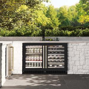 ZLINE Autograph Edition 24 in. Touchstone Dual Zone 44 Bottle Wine Cooler With Black Matte Glass Door And Champagne Bronze Handle (RWDOZ-BLM-24-CB) front, in an outdoor kitchen with a matching beverage fridge displaying drinks and bottles.