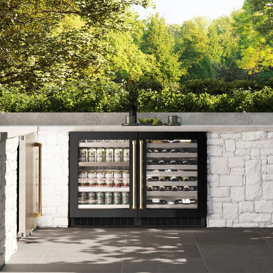 ZLINE Autograph Edition 24 in. Touchstone 151 Can Beverage Fridge With Black Stainless Steel Glass Door And Polished Gold Handle (RBSOZ-BS-24-G) front, in a luxury outdoor kitchen.