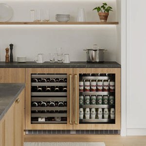 ZLINE Autograph Edition 24 in. Touchstone Dual Zone 44 Bottle Wine Cooler With Panel Ready Glass Door And Polished Gold Handle (RWDPOZ-24-G) in a luxury kitchen.