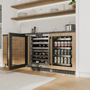 ZLINE Autograph Edition 24 in. Touchstone 151 Can Beverage Fridge With Panel Ready Glass Door And Matte Black Handle (RBSPOZ-24-MB) in a custom home bar area from side, with wine on adjustable shelves.