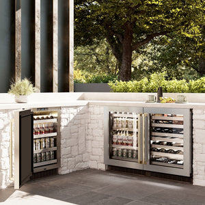 ZLINE Autograph Edition 24 in. Touchstone 151 Can Beverage Fridge With Satin Stainless Steel Glass Door And Champagne Bronze Handle (RBSOZ-SN-24-CB) in a luxury outdoor patio, side.