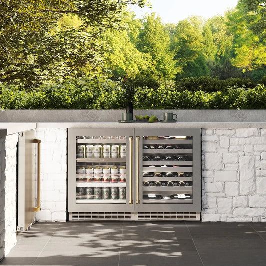 ZLINE Autograph Edition 24 in. Touchstone 151 Can Beverage Fridge With Satin Stainless Steel Glass Door And Polished Gold Handle (RBSOZ-SN-24-G) front, in a luxury outdoor kitchen.