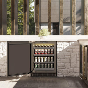 ZLINE Autograph Edition 24 in. Touchstone 151 Can Beverage Fridge With Solid Stainless Steel Door And Polished Gold Handle (RBSOZ-ST-24-G) front, in a luxury outdoor kitchen, open.
