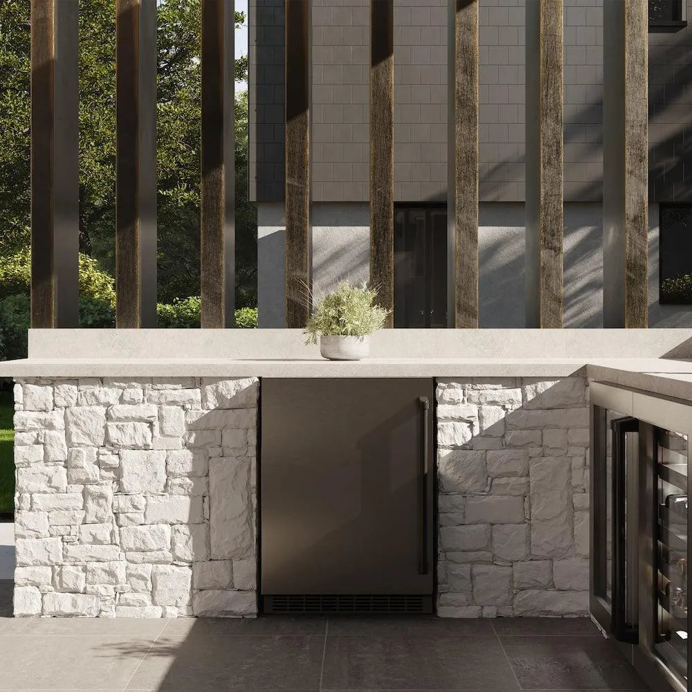 ZLINE Autograph Edition 24 in. Touchstone 151 Can Beverage Fridge With Solid Stainless Steel Door And Matte Black Handle (RBSOZ-ST-24-MB) front, in a luxury outdoor kitchen.