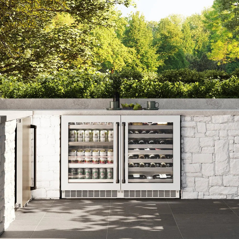 ZLINE Autograph Edition 24 in. Touchstone 151 Can Beverage Fridge With White Matte Glass Door And Matte Black Handle (RBSOZ-WM-24-MB) front, in a luxury outdoor kitchen.