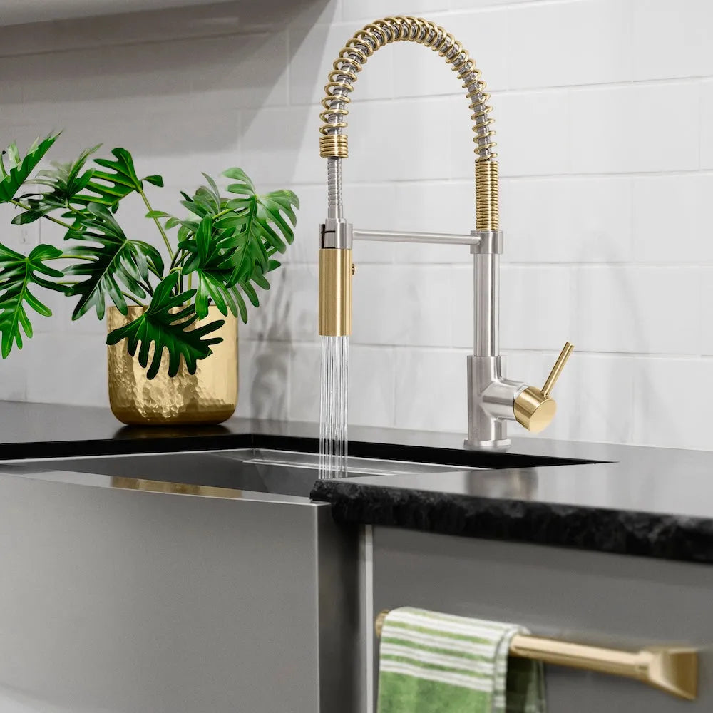 Modern kitchen sink with ZLINE Autograph Edition Sierra Pull Down Spring Single Handle Kitchen Faucet in Brushed Nickel and Champagne Bronze (SRA-KF-ZBNCB) and black countertop