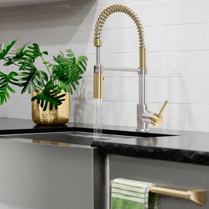 Modern kitchen sink with ZLINE Autograph Edition Sierra Pull Down Spring Single Handle Kitchen Faucet in Brushed Nickel and Champagne Bronze (SRA-KF-ZBNCB) and black countertop