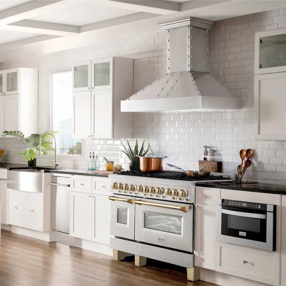 Modern farmhouse kitchen with ZLINE Autograph Edition 48 in. 6.0 cu. ft. Legacy Dual Fuel Range with 7 Burner Gas Cooktop and 2 Electric Ovens in Stainless Steel and Polished Gold Accents (RAZ-48-G), white cabinets, stainless steel appliances, and a tiled backsplash.