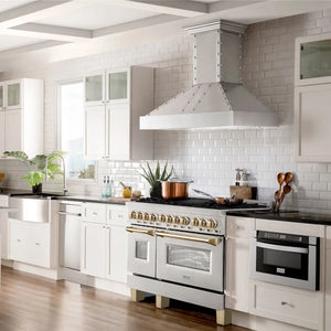 Modern farmhouse kitchen with ZLINE Autograph Edition 48 in. 6.0 cu. ft. Legacy Dual Fuel Range with 7 Burner Gas Cooktop and 2 Electric Ovens in Stainless Steel and Polished Gold Accents (RAZ-48-G), white cabinets, stainless steel appliances, and a tiled backsplash.