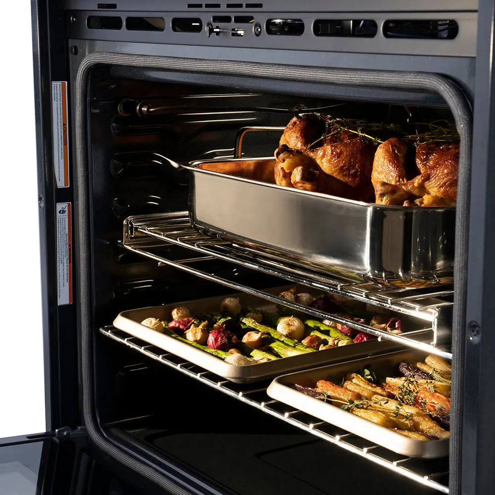 ZLINE Autograph Edition 30 in. Professional True Convection Double Wall Oven with Air Fry and Self Clean in Stainless Steel with Polished Gold Helix Handles (WADZ-30-KG) oven interior with roasted chickens with herbs, showing the cooking process.