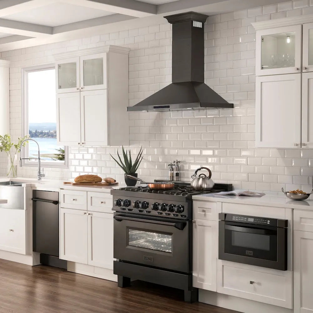 ZLINE 36 in. Convertible Vent Wall Mount Range Hood in Black Stainless Steel with Crown Molding (BSKBNCRN-36) in a luxury kitchen.