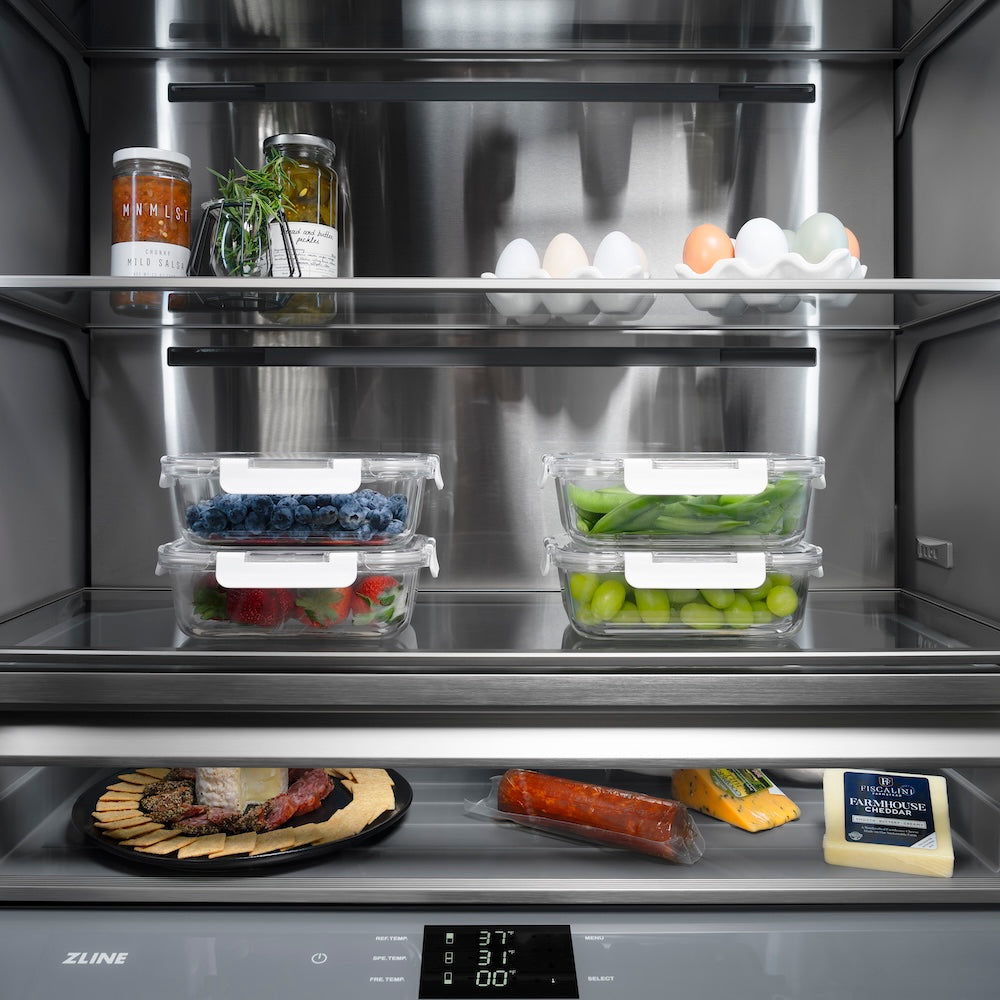ZLINE Autograph Edition 60 in. 32.2 cu. ft. French Door Built-In Bottom Freezer Refrigerator with Water Dispenser and Ice Maker in Satin Stainless Steel with Graphite Gray Interior and Polished Gold Accents (GRBIVZ-SN-60-G) refrigeration compartment interior with food on shelves.