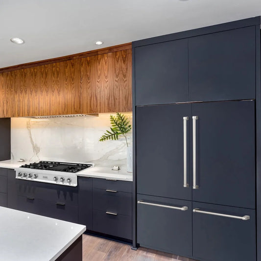 Designer kitchen with ZLINE 60 in. 32.2 cu. ft. Panel Ready French Door Built-In Bottom Freezer Refrigerator with Water Dispensers and Ice Makers (RBIV-60) with custom dark blue panels.