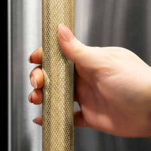 ZLINE Autograph Edition 30 in. Built-In Refrigerator Helix Handles (Set of 2) in Champagne Bronze (RBIVHZ-K-CB-30) on appliance showing diamond knurled details.
