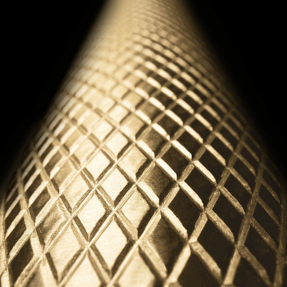 ZLINE Autograph Edition 15 in. Touchstone Clear Cube Ice Maker with Drain Pump and Solid Stainless Steel Door with Champagne Bronze Helix Handle (ICCDZ-ST-15-KCB) knurled diamond-texture on handle.