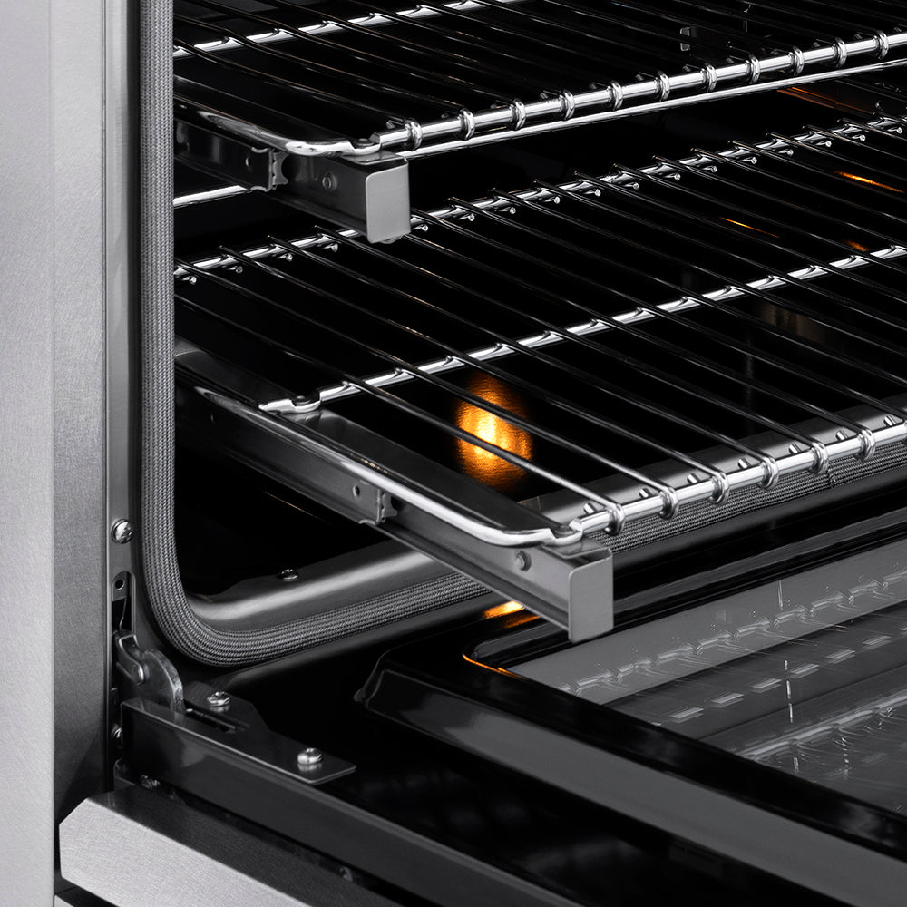 ZLINE Autograph Edition 48 in. 6.7 cu. ft. Classic Dual Fuel Range with 8 Burner DuoPro™ Cooktop and Dual Ovens in Satin Stainless Steel and Champagne Bronze Accents (PCDRSZ-48-CB) close-up, Smooth Glide oven racks.