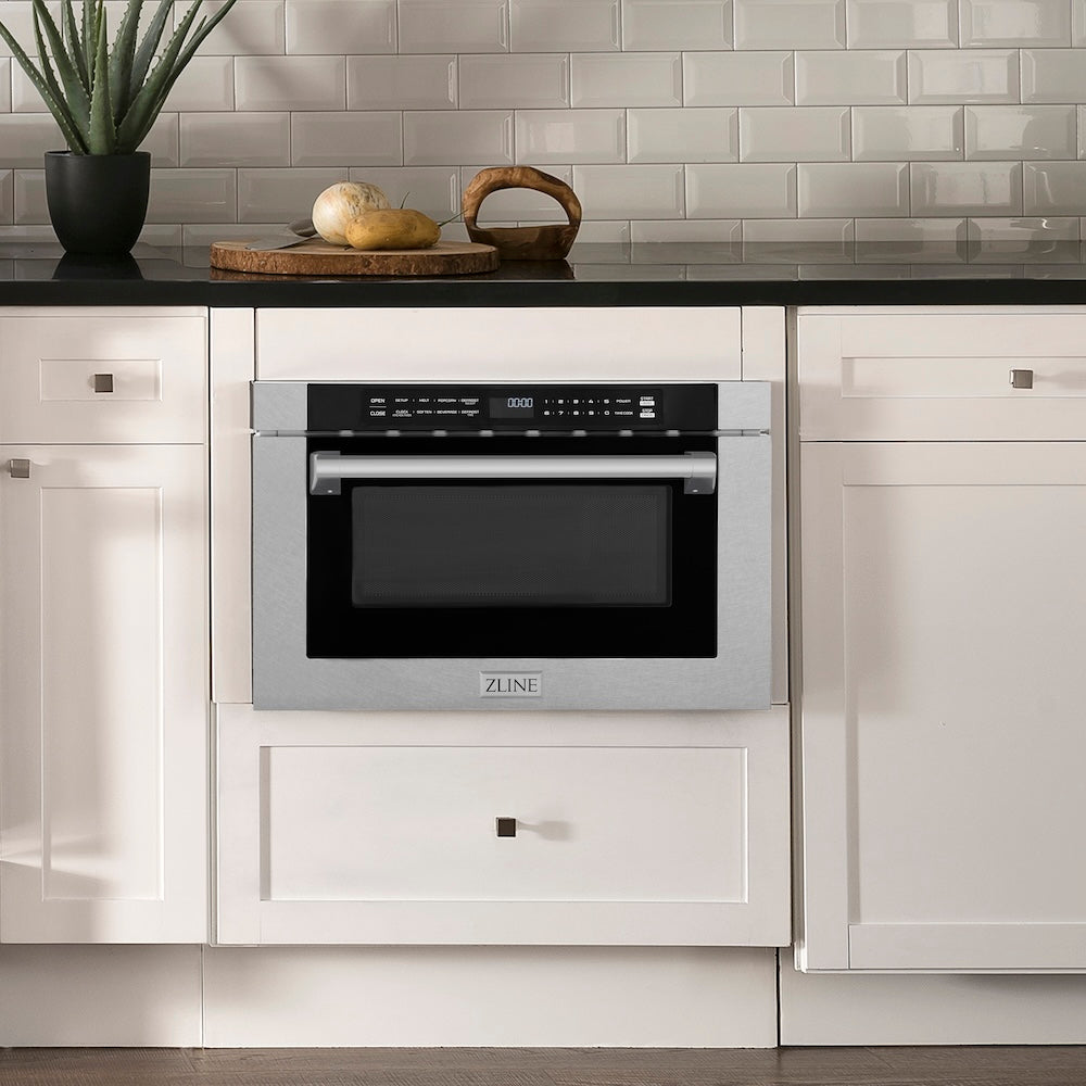 ZLINE 24 in. 1.2 cu. ft. Built-in Microwave Drawer with a Traditional Handle in Satin Stainless Steel (MWD-1-SS-H) in a modern farmhouse kitchen with white cabinets and black countertop.