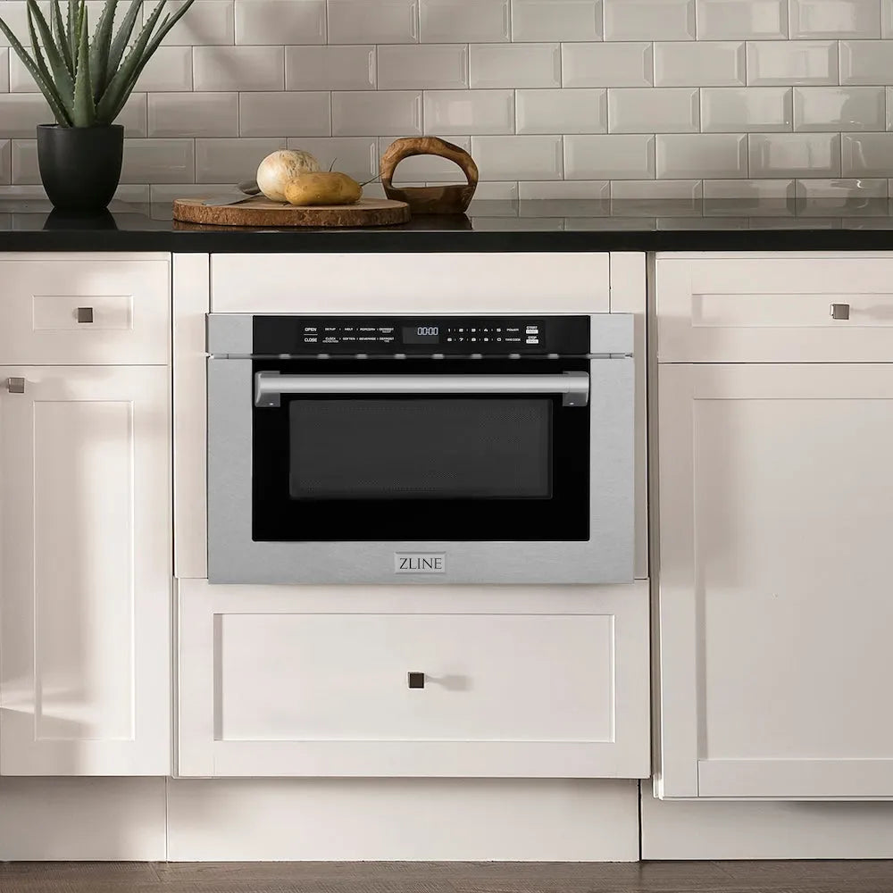 ZLINE 24 in. 1.2 cu. ft. Built-in Microwave Drawer with a Traditional Handle in Satin Stainless Steel (MWD-1-SS-H) in a modern farmhouse kitchen with white cabinets and black countertop.