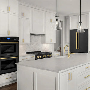 Modern kitchen with white cabinets, ZLINE Autograph Edition 36 in. 21.6 cu. ft. Counter-Depth French Door Refrigerator with Water and Ice Dispenser in Fingerprint-Resistant Black Stainless Steel with Polished Gold Traditional Handles (RFMZ-W-36-BS-G), and gold fixtures.