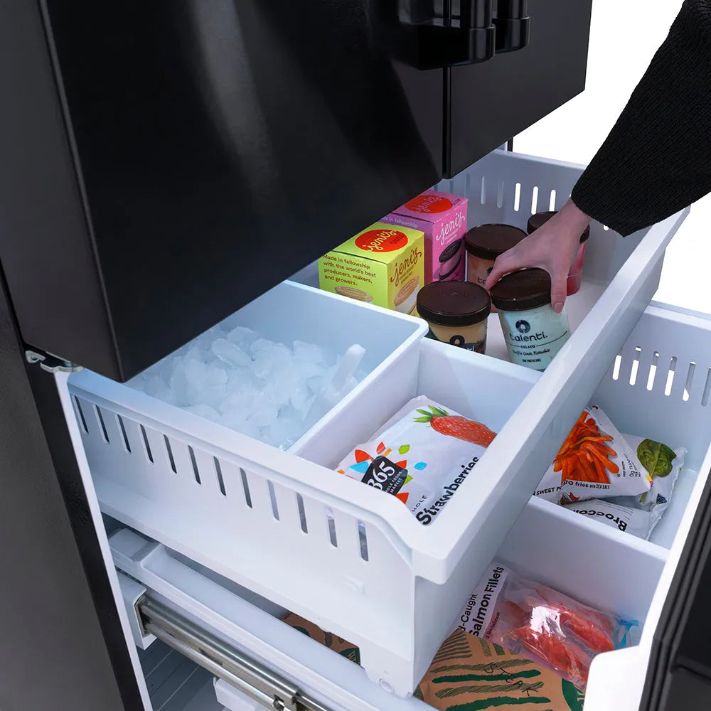 Open ZLINE 36 in. 28.9 cu. ft. Standard-Depth French Door External Water Dispenser Refrigerator with Dual Ice Maker in Fingerprint-Resistant Black Stainless Steel (RSM-W-36-BS) with various food items inside, including a hand reaching in.