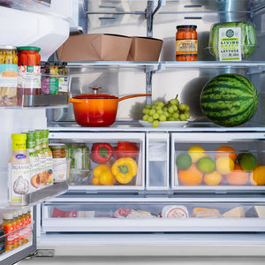 Open ZLINE 36 in. 28.9 cu. ft. Standard-Depth French Door External Water Dispenser Refrigerator with Dual Ice Maker in Fingerprint-Resistant Stainless Steel (RSM-W-36) with various food items including fruits, vegetables, and a pot.