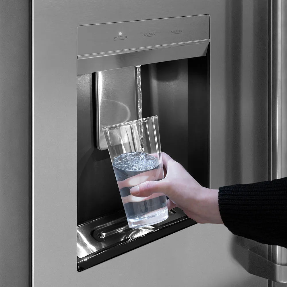 Hand filling a glass with water from a built-in water dispenser on ZLINE 36 in. 28.9 cu. ft. Standard-Depth French Door External Water Dispenser Refrigerator with Dual Ice Maker in Fingerprint-Resistant Stainless Steel (RSM-W-36)