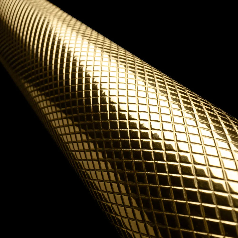 ZLINE Autograph Edition 30 in. Helix Handle (Set of 1) for Paramount and Select Ranges in Polished Gold (SGZ-054B-K-G) close-up, Polished Gold Helix handle showing knurled diamond texture.