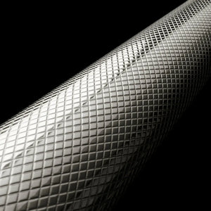 ZLINE Autograph Edition 30 in. Wall Oven Helix Handle (Set of 1) in Polished Nickel (AWHZ-30-K-PN) Polished Nickel Helix handle close-up showing knurled diamond texture on a black background.
