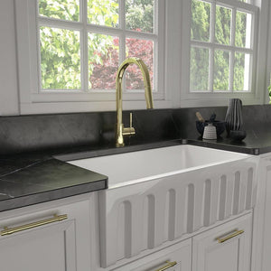 ZLINE Gemini Pull Down Kitchen Faucet in Polished Gold (GEM-KF-PG) in a farmhouse kitchen.