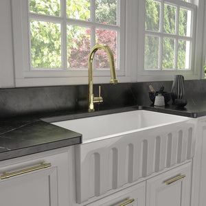 ZLINE Monet Pull Down Kitchen Faucet in Polished Gold (MON-KF-PG) in a farmhouse kitchen.