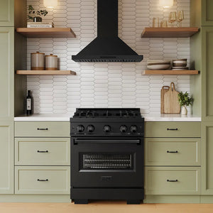 ZLINE 30 in. Convertible Vent Wall Mount Range Hood in Black Stainless Steel (BSKBN-30) above a black range in a kitchen with green cabinets and wooden shelves.