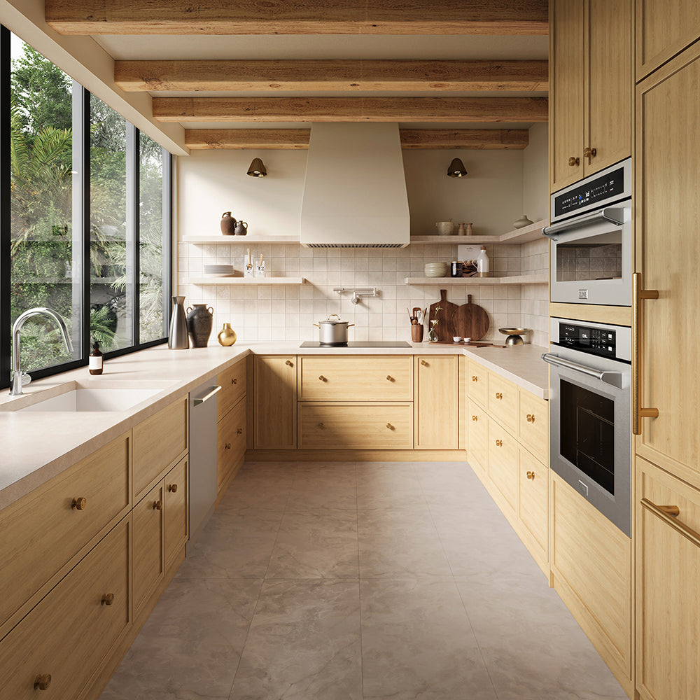 ZLINE 36 in. Induction Cooktop with Anti-Scratch Glass and 5 Elements (FCIND-36) in a kitchen interior with light wood cabinetry, beige stone countertops and floor, open shelving, a white range hood, and built-in stainless steel appliances.