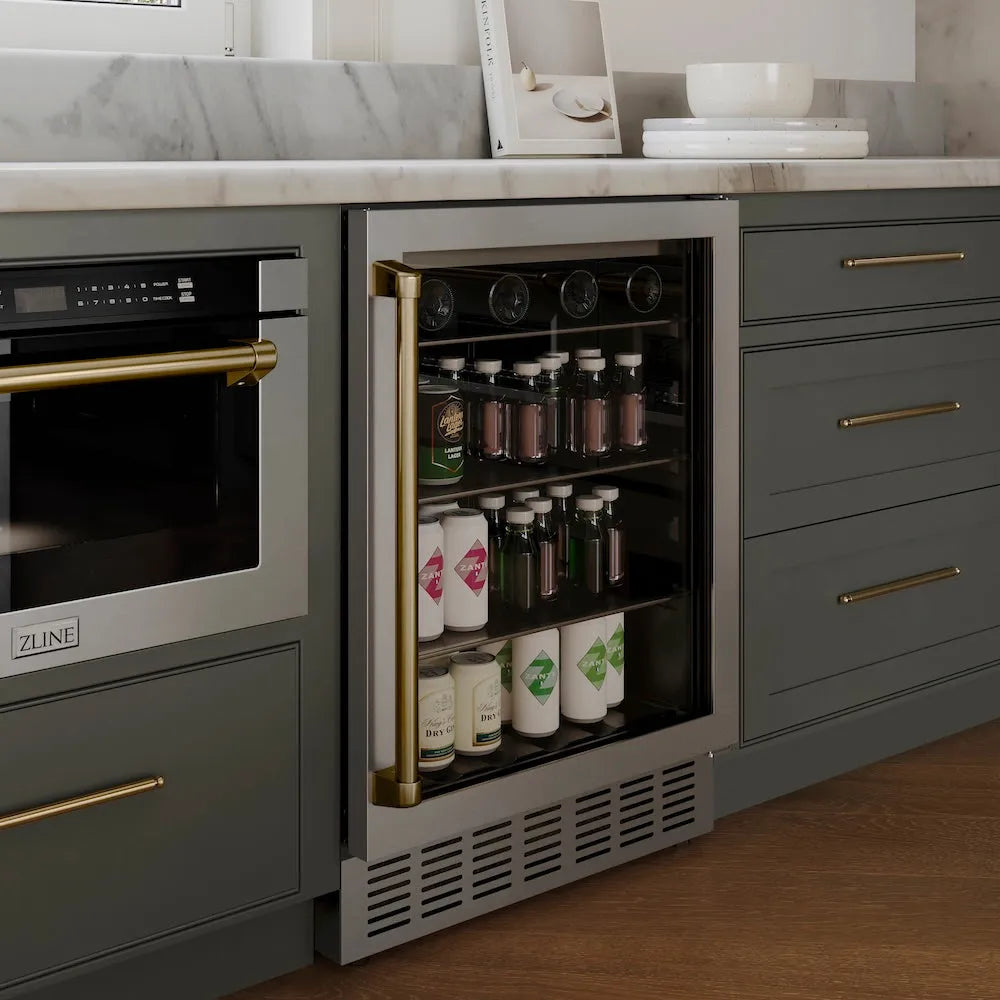 Modern kitchen with a ZLINE Autograph Edition 24 in. Monument 154 Can Beverage Fridge in Stainless Steel with Champagne Bronze Accents (RBVZ-US-24-CB)