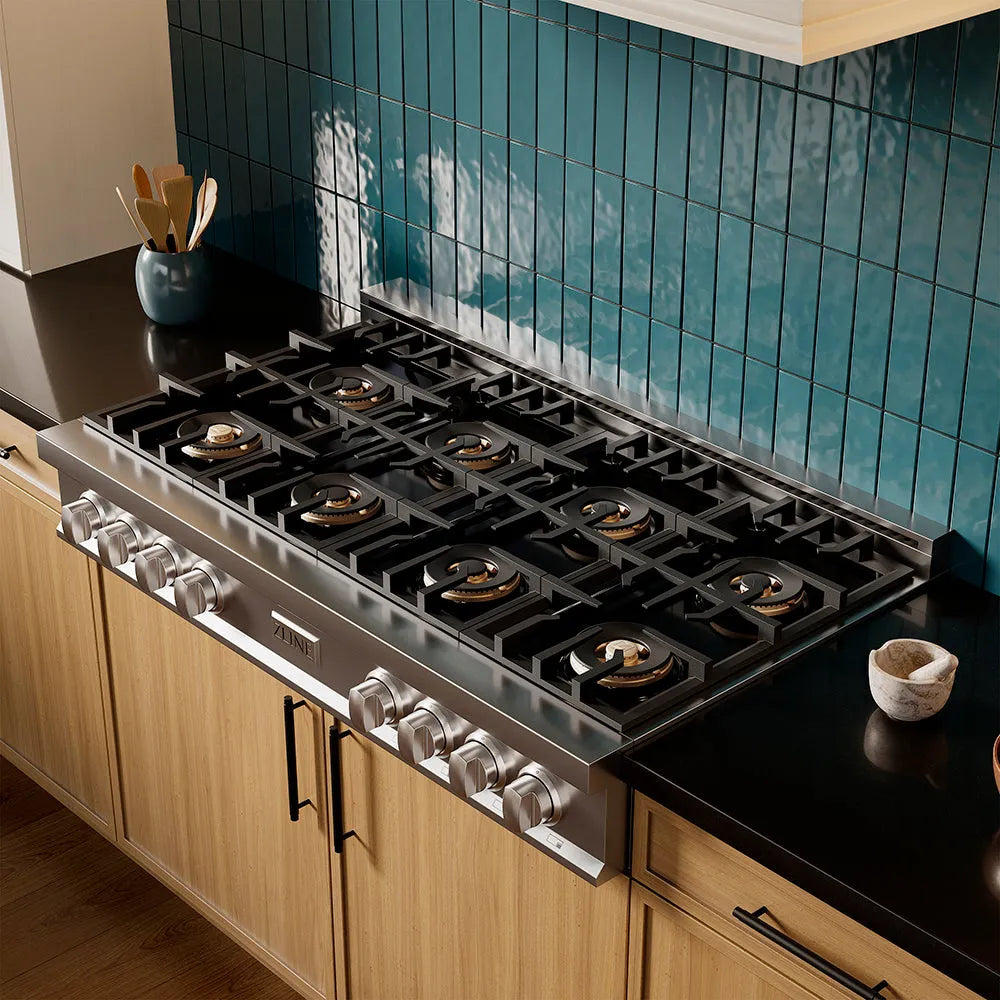 ZLINE 48 in. Classic Gas Rangetop with 8 Burner DuoPro™ Cooktop in Stainless Steel (PCRT48) in a luxury kitchen with wooden cabinets and blue tiled backsplash, side.