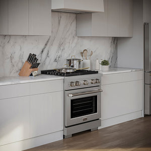 ZLINE 30 in. 4.2 cu. ft. Paramount Gas Range with 4 Burner DuoPro™ Cooktop and Convection Gas Oven in Satin Stainless Steel (PSGRS-30) in a luxury kitchen with white marble backsplash and white cabinets.