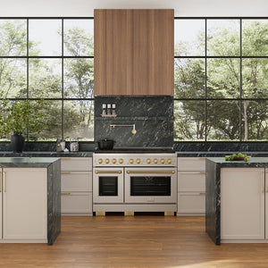 ZLINE 46 in. DuraMount™ Wall Mount Range Hood Insert in Stainless Steel (683-46) in a designer kitchen with a custom wood range hood above a stainless steel range next to large windows.