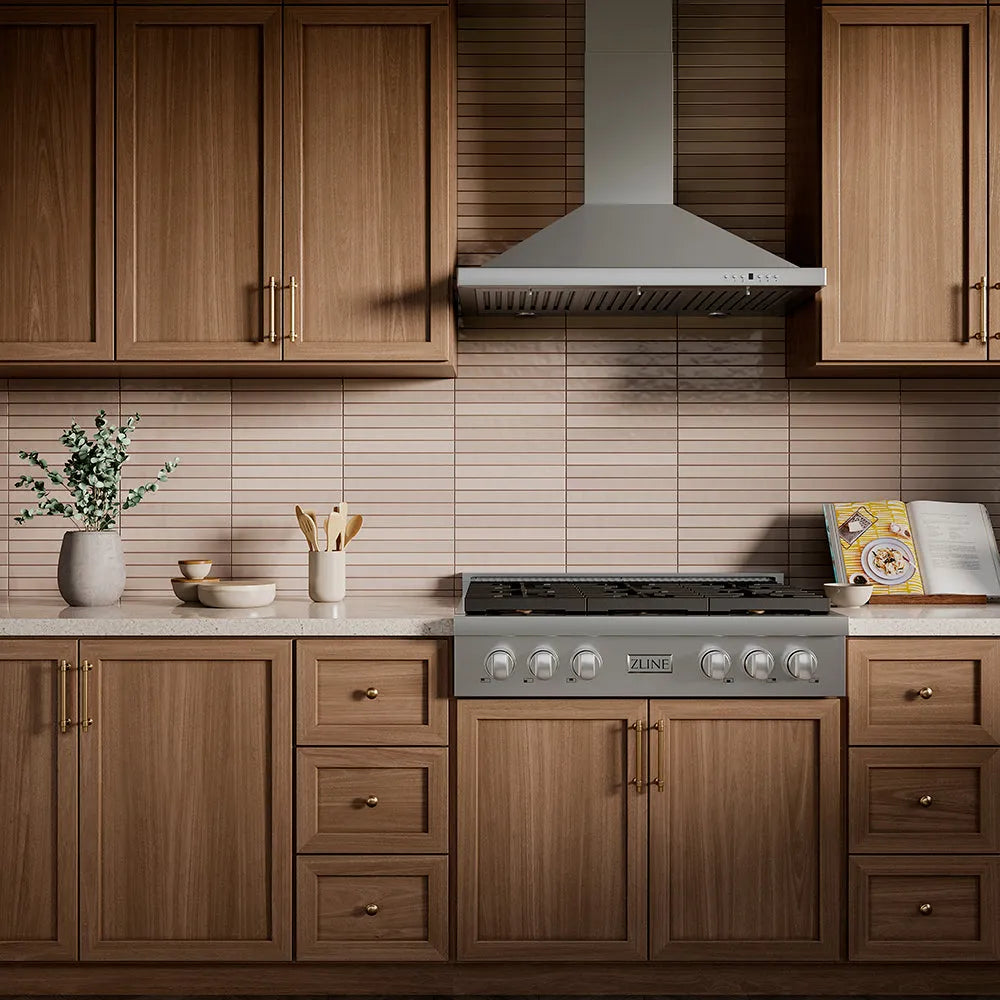 ZLINE 36 in. Paramount Gas Rangetop with 6 Burner DuoPro™ Cooktop in Stainless Steel (PSRT36) in a kitchen with wooden cabinets and decorative elements.
