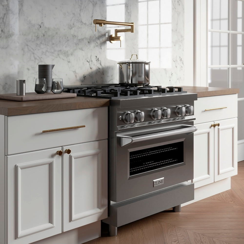 ZLINE Gemini Pot Filler in Polished Gold (GEM-FPF-PG) in a kitchen with a stainless steel range.
