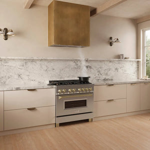 ZLINE 34 in. DuraMount™ Wall Mount Range Hood Insert in Stainless Steel (683-34) in a designer kitchen with marble backsplash, custom range hood, and decorative elements, side.