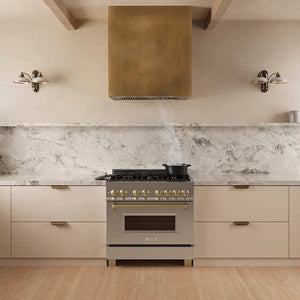 ZLINE 34 in. DuraMount™ Wall Mount Range Hood Insert in Stainless Steel (683-34) in a designer kitchen with a custom wood range hood above a stainless steel range,