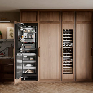 ZLINE 24 in. 12.4 cu. ft. Panel Ready Column Freezer with Graphite Gray Interior (RBCFV-24) in a luxury kitchen.