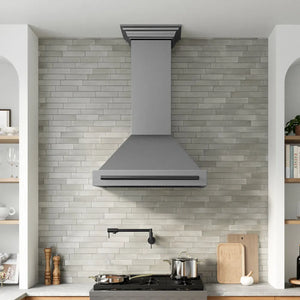 ZLINE Autograph Edition 36 in. Wall-Mount Range Hood Helix Handle (Set of 1) in Matte Black (RHHZ-K-MB-36) installed in a designer kitchen.
