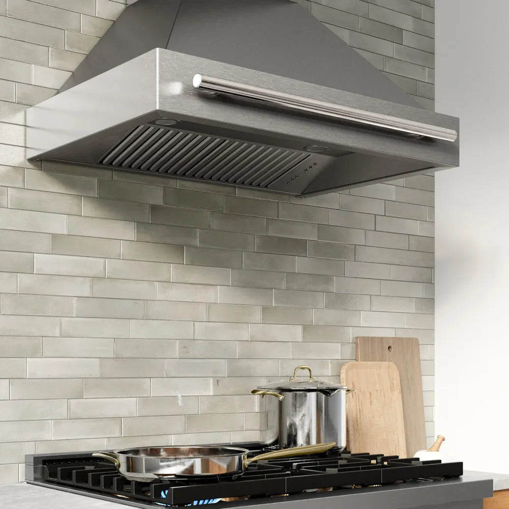ZLINE Autograph Edition 36 in. Wall-Mount Range Hood Helix Handle (Set of 1) in Polished Nickel (RHHZ-K-PN-36) installed in a designer kitchen.