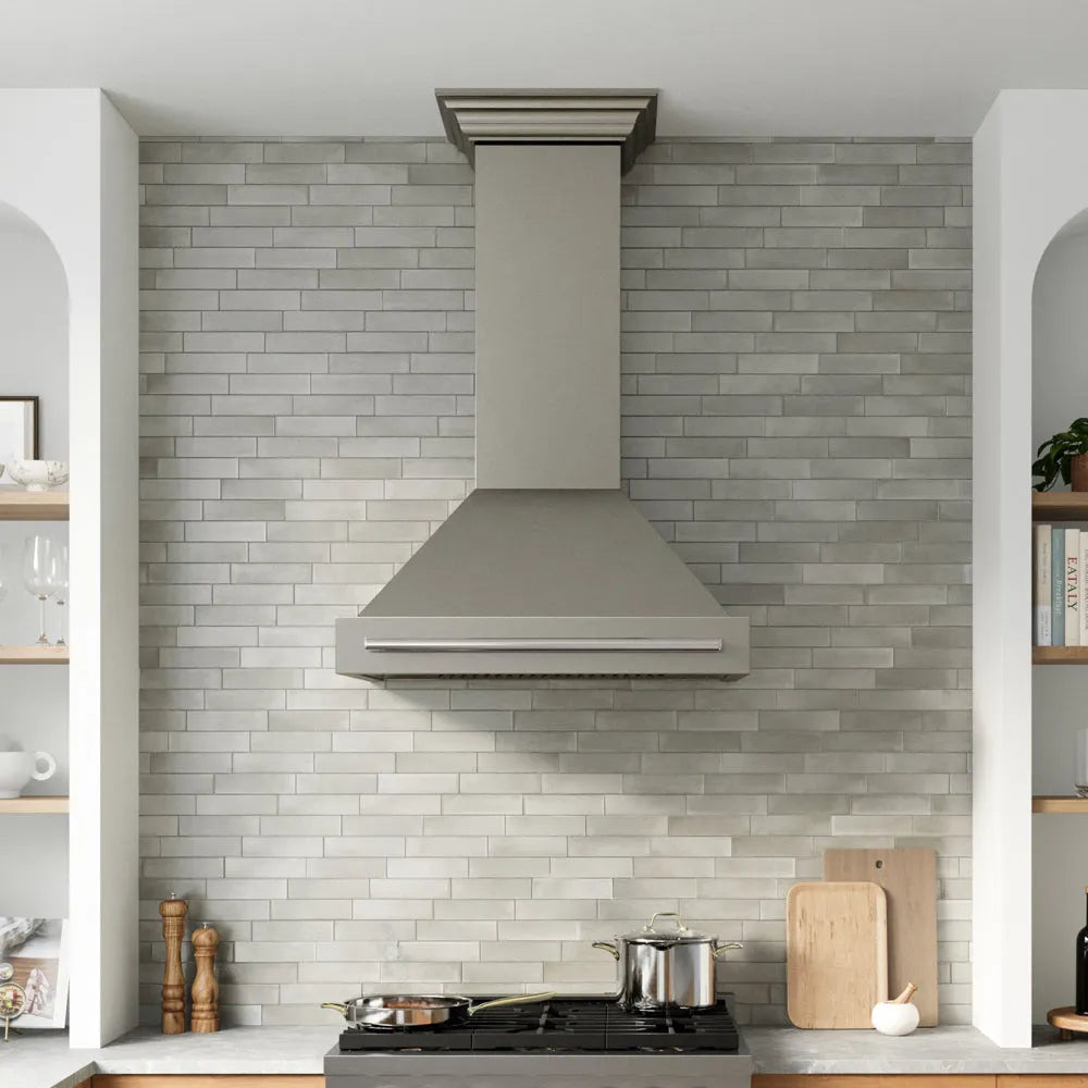 ZLINE Autograph Edition 36 in. Wall-Mount Range Hood Helix Handle (Set of 1) in Polished Nickel (RHHZ-K-PN-36) installed in a designer kitchen.