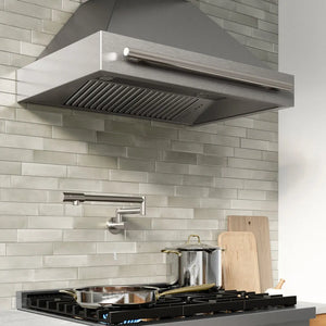 ZLINE 36 in. Wall-Mount Range Hood Helix Handle (Set of 1) in Stainless Steel (RHHZ-K-ST-36) installed in a designer kitchen.